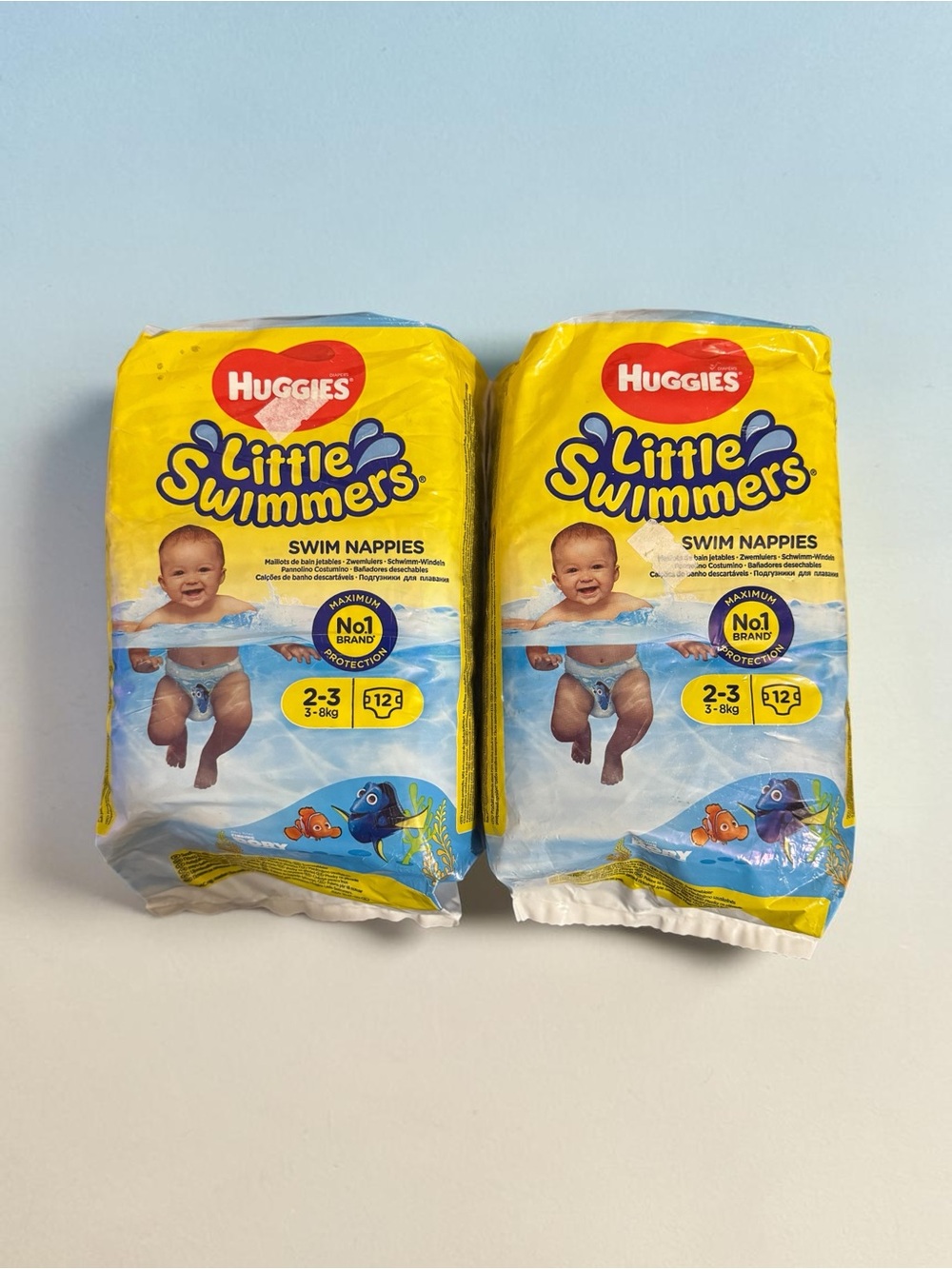 2 Huggies Little Swimmers Disposable Swim Diapers, X-Small (7lb-18lb.) 12-Count